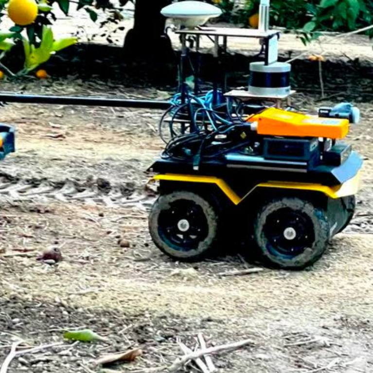 Robot assisting with precision irrigation in an orchard