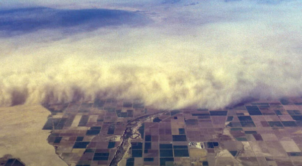 An aerial view of a dust storm overrunning the Imperial Valley, California. The Salton Sea can be seen upper left.