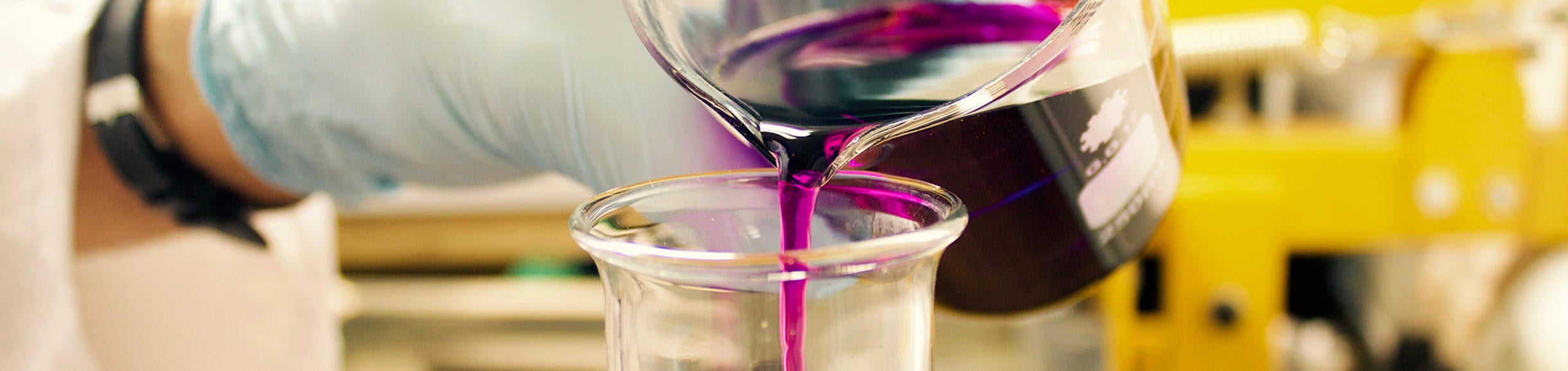purple liquid being poured (c) Louis Reed unsplash