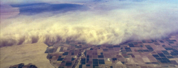 An aerial view of a dust storm overrunning the Imperial Valley, California. The Salton Sea can be seen upper left.
